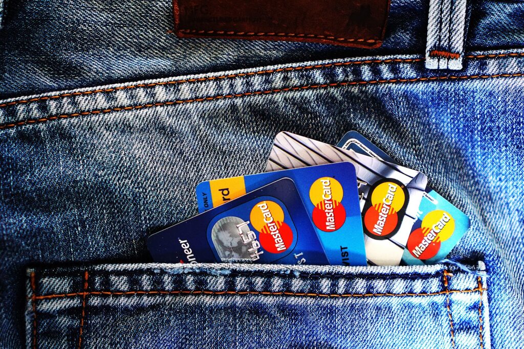 MasterCard credit cards in jeans pocket