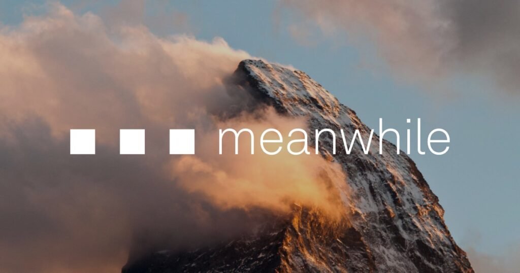 Meanwhile logo over a mountain peak